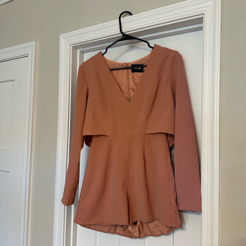 Pinky Romper with cape back.